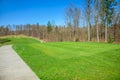 High ange shot of a golf course in Otocec, Slovenia on a sunny summer day