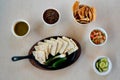 High angel shot of quesadilla with chicken and sauces, chips on the table Royalty Free Stock Photo