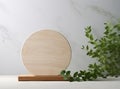 High angl round wooden podium tray on white glossy table counter with tree twig. Royalty Free Stock Photo