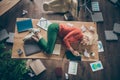 High angle above view photo of corporate messy atmosphere unorganized blond business lady lying table don`t mind