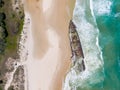 High angle aerial bird`s eye drone view of the SS Maheno shipwreck, an ocean liner which ran aground on Seventy-Five Mile Beach