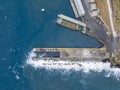 High angle aerial drone bird`s eye view of the harbour of Stanley with a breakwater sea wall pier, north-west coast Tasmania Royalty Free Stock Photo