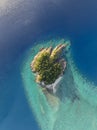 High angle aerial drone view of Arkhurst Island, a small islet next to Hayman Island