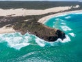 High angle aerial drone view of famous Indian Head headland which marks both the most easterly point on the island