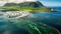 High angle aerial view of a a fish farm off the coast in the blue, sea during day time