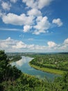 High angle, altitude view to the Nistru river bank, near Soroca city, Moldova. Idyllic vertical scene to the green valley with Royalty Free Stock Photo
