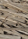 Old dry split lumber piled up high