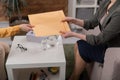 Cropped photo of psychologist`s hands giving folder with test results to patient