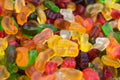 High angle closeup shot of hundreds of colorful gummy bears