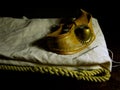 High angle closeup shot of old sailmaker`s tools on a black background Royalty Free Stock Photo