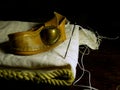 High angle closeup shot of old sailmaker`s tools on a black background Royalty Free Stock Photo