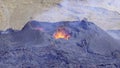 High-angle closeup of a volcanic eruption round crater smog fire in Royalty Free Stock Photo