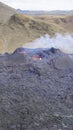 High-angle closeup of a volcanic eruption round crater smog fire in Royalty Free Stock Photo