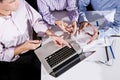 High angle cropped view, office workers on laptop Royalty Free Stock Photo