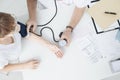 General doctor measuring blood pressure