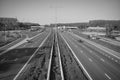 High angle grayscale shot of cars on a highway at daytime