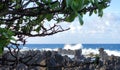 High-angle of Hawaii coast low tide water crash against rocks, cloudy sunlit sky background Royalty Free Stock Photo