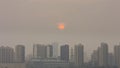 High angle horizontal building shot of sunset in beijing on a foggy day