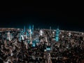 High angle of illuminated cityscape of New York skyscrapers at night with dark sky Royalty Free Stock Photo