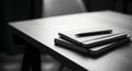 Minimalist Black and White Desk with Notebooks Royalty Free Stock Photo