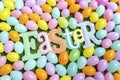 High angle of Easter banner letters and lots of Easter eggs