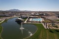 High-angle of a neighborhood lake fountain, ducks pool in Arizona