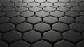 A high contrast abstract background featuring a perspective view of dark grey geometric hexagons Royalty Free Stock Photo