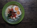 High angle photo of a bowl of instant noodle soup with coconut milk