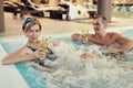 Modern Senior Couple Enjoying Hot Tub at Resort Royalty Free Stock Photo