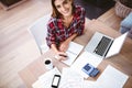 High angle portrait of smiling woman writing in notepad Royalty Free Stock Photo