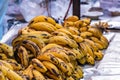 High angle shot of Banans piled up on a shelf in Healthy concept Royalty Free Stock Photo