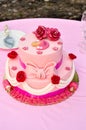 High-angle shot of a beautiful pink birthday cake of a girl with the name Margh Royalty Free Stock Photo