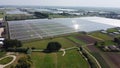 High-angle shot of a big modern greenhouse in the rural area of Zwolle, Netherlands.