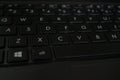 High angle shot of a black laptop keyboard