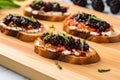 high-angle shot of blackberries atop lightly toasted bruschetta