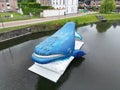 High-angle shot of a blue whale statue on a part of the Dender River in Dendermonde, Belgium