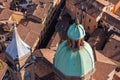 A high-angle shot of Bologna city center, highlighting the Church of Saints Bartholomew and Cajetan