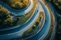 A high-angle shot capturing a busy highway with multiple lanes filled with vehicles in motion during daylight, An aerial shot of Royalty Free Stock Photo