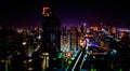 High-angle shot of the city of Bangkok during the night with colorful neon lights