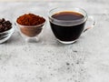 HIgh angle shot of coffee beans,powder and black coffee Royalty Free Stock Photo