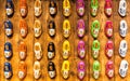 High angle shot of colorful decorative clog shoes on a wooden surface - great for a cool background