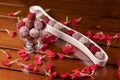 High angle shot of colorful gourmet chocolate balls on a romantic valentines table