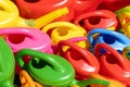 High angle shot of colorful vibrant plastic watering cans