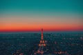 High angle shot of the Eiffel tower spreading light in Paris, the city of love during nighttime Royalty Free Stock Photo