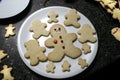 High angle shot of gingerbreads in a plate on the table Royalty Free Stock Photo