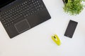 High angle shot of items on a table at an office workstation