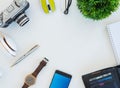 High angle shot of items on a table at an office workstation