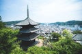 High angle shot of the Japanese pagoda touching the sky in Onomichi, Japan