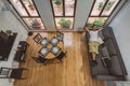 High angle shot of a living room with a male model