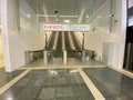 High angle shot of long escalators going up and down in a building